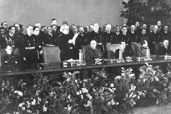 Slovak prime minister Vojtech Tuka (front row, standing) announces Slovakia's entry into the Axis alliance